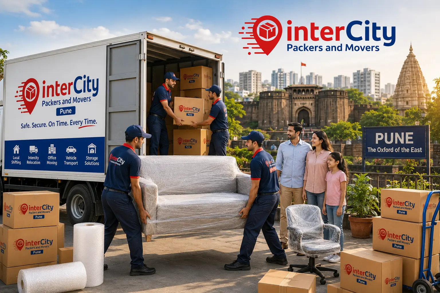 InterCity Packers and Movers crew loading wrapped furniture and labelled cartons into a moving truck in Pune